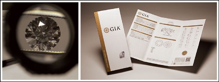 En slipad diamant sedd genom en lupp bredvid ett GIA-certifikat.